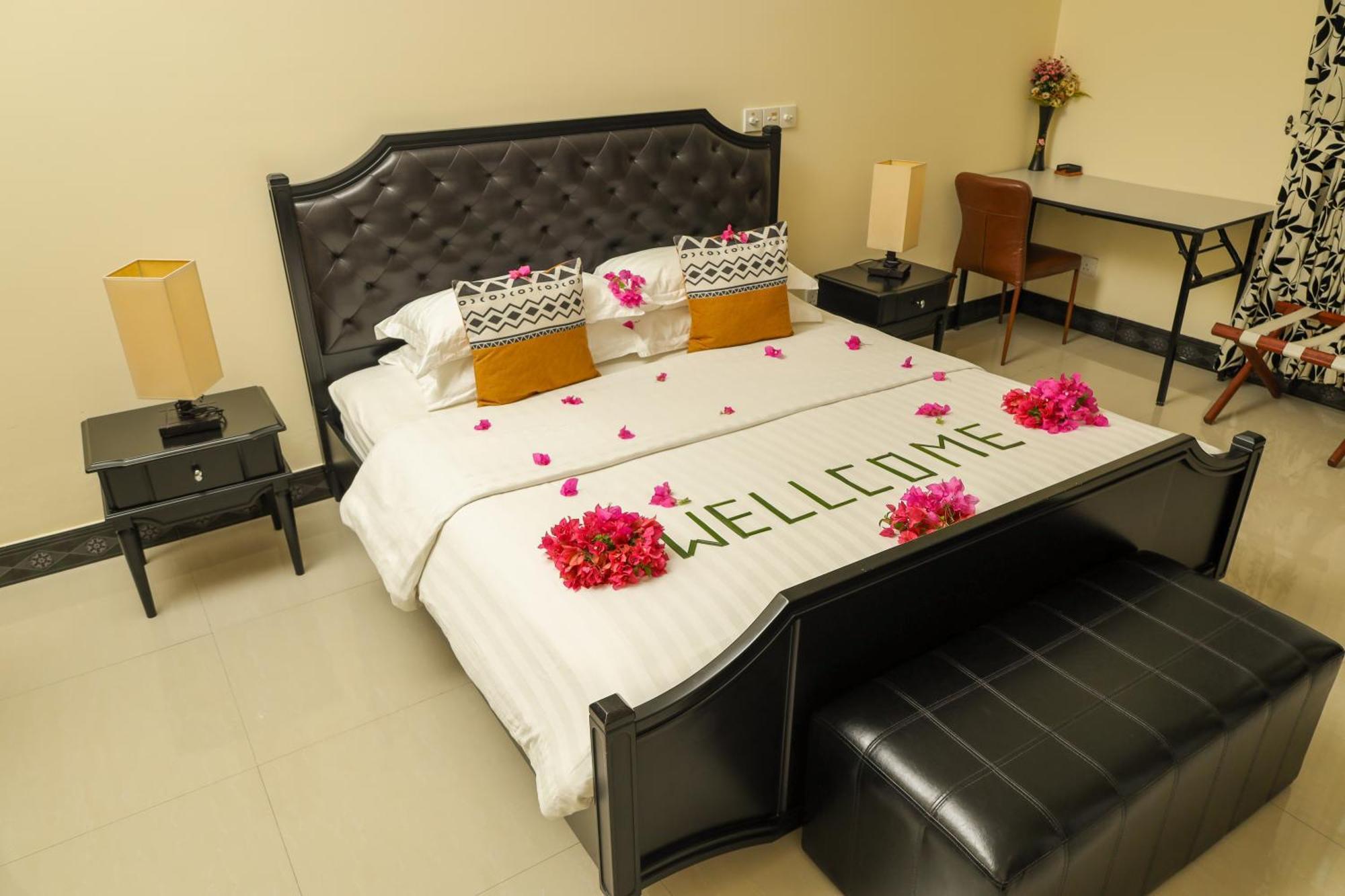 نزل Charming Holiday أدو أتول المظهر الخارجي الصورة