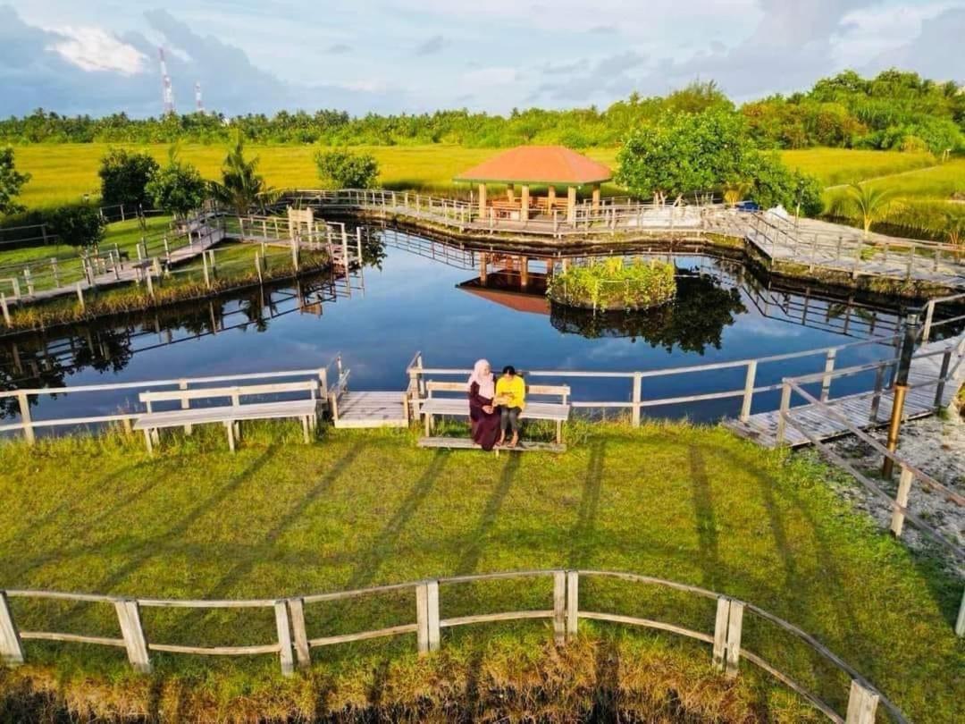 نزل Charming Holiday أدو أتول المظهر الخارجي الصورة